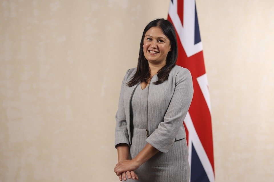 Lisa Nandy stood in front of a union jack flag